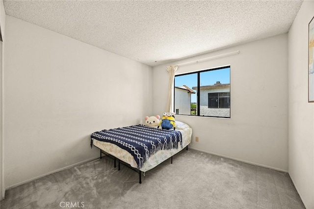 422 S Alhambra Ave Unit A, Monterey Park, CA 91755 - carpeted bedroom featuring a textured ceiling