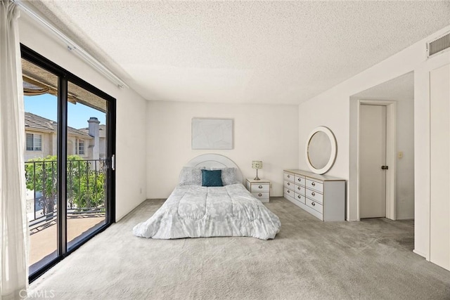 422 S Alhambra Ave Unit A, Monterey Park, CA 91755 - carpeted bedroom featuring access to exterior and a textured ceiling