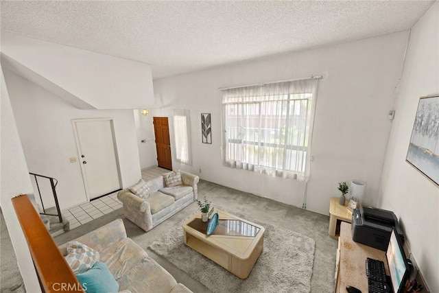 422 S Alhambra Ave Unit A, Monterey Park, CA 91755 - carpeted living area featuring a textured ceiling
