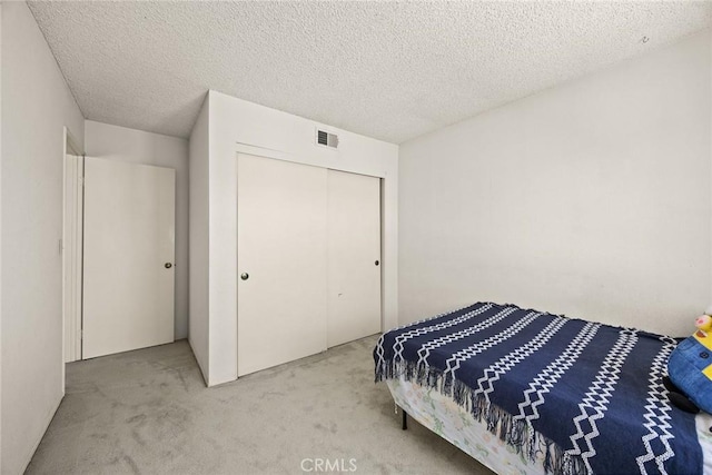 422 S Alhambra Ave Unit A, Monterey Park, CA 91755 - bedroom with carpet, a closet, and a textured ceiling
