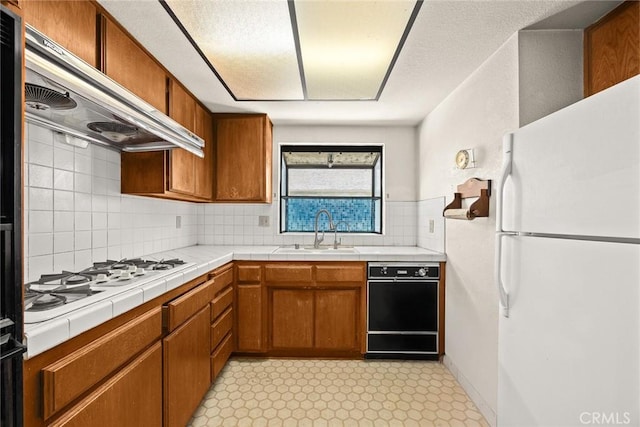 422 S Alhambra Ave Unit A, Monterey Park, CA 91755 - kitchen featuring white appliances, a sink, custom range hood, decorative backsplash, and brown cabinets