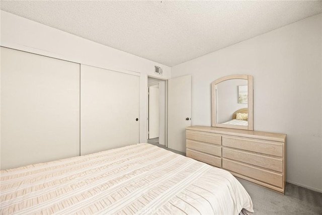 422 S Alhambra Ave Unit A, Monterey Park, CA 91755 - bedroom featuring light colored carpet, a closet, and a textured ceiling