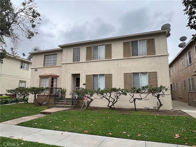 1110 E Carson St, Long Beach, CA 90807 - multi unit property with stucco siding and a front yard