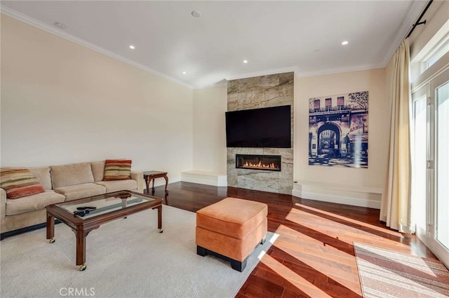 11837 Rideout Way, Whittier, CA 90601 - living area with ornamental molding, wood finished floors, a premium fireplace, baseboards, and recessed lighting