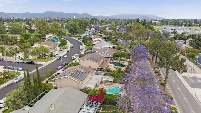 1099 N Agusta Ave, Camarillo, CA 93010 - aerial perspective of suburban area featuring a mountain backdrop and a pool area