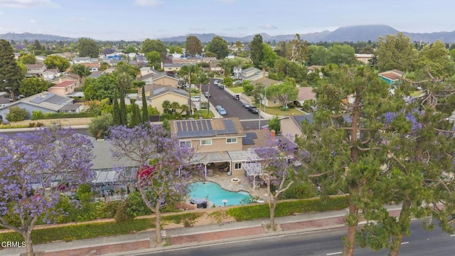 1099 N Agusta Ave, Camarillo, CA 93010 - aerial view of property's location featuring a mountain backdrop and nearby suburban area