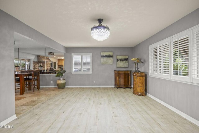 1099 N Agusta Ave, Camarillo, CA 93010 - dining space featuring wood finished floors and a chandelier