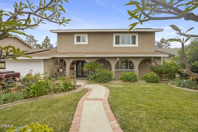 1099 N Agusta Ave, Camarillo, CA 93010 - traditional home with stucco siding, a front lawn, a garage, and a porch