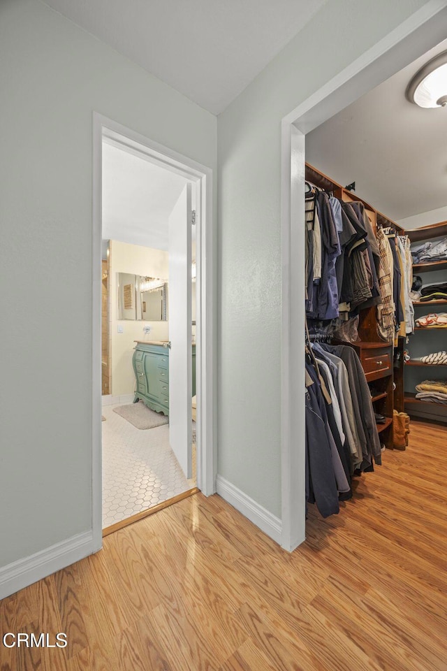 1099 N Agusta Ave, Camarillo, CA 93010 - walk in closet with wood finished floors