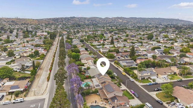 1099 N Agusta Ave, Camarillo, CA 93010 - aerial view of property and surrounding area featuring nearby suburban area and a mountain backdrop