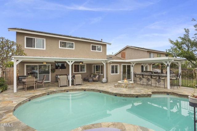 1099 N Agusta Ave, Camarillo, CA 93010 - view of swimming pool with an outdoor living space with a fire pit and a patio area