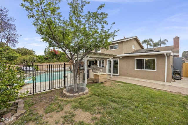 1099 N Agusta Ave, Camarillo, CA 93010 - rear view of house with a fenced backyard, exterior kitchen, stucco siding, and a patio area