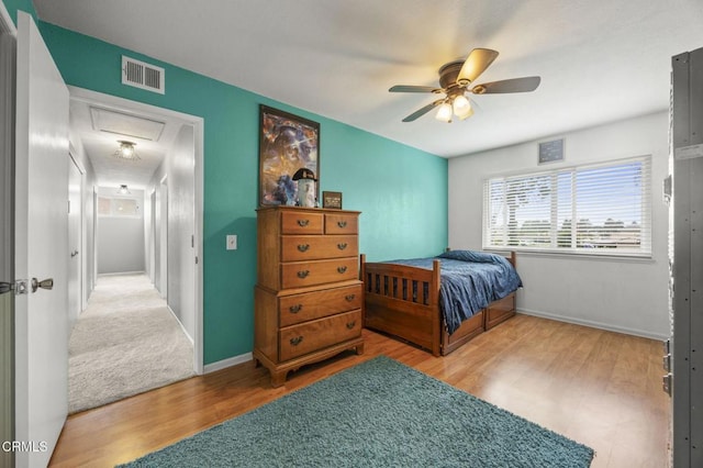 1099 N Agusta Ave, Camarillo, CA 93010 - bedroom featuring wood finished floors, a ceiling fan, and attic access
