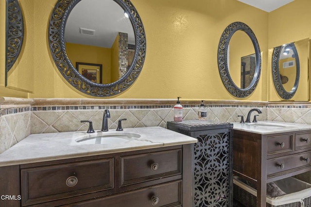 1099 N Agusta Ave, Camarillo, CA 93010 - bathroom with two vanities, tile walls, and a wainscoted wall