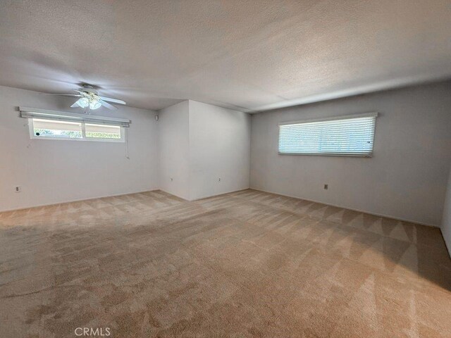 25620 Cherry Hills Blvd, Menifee, CA 92586 - unfurnished room featuring light carpet, a textured ceiling, and ceiling fan