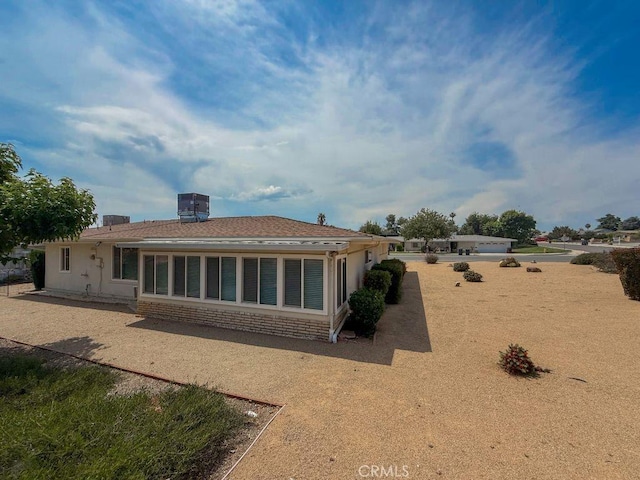 25620 Cherry Hills Blvd, Menifee, CA 92586 - rear view of house featuring a shingled roof