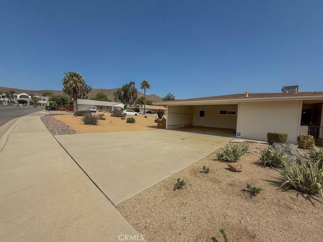 25620 Cherry Hills Blvd, Menifee, CA 92586 - view of front of home featuring an attached carport and concrete driveway