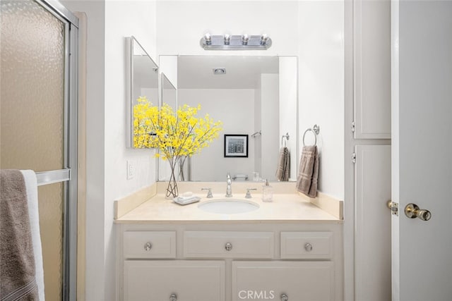3721 Country Club Dr Unit 18, Long Beach, CA 90807 - bathroom featuring vanity and a shower with shower door