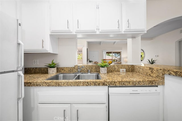 3721 Country Club Dr Unit 18, Long Beach, CA 90807 - kitchen with white appliances, white cabinetry, and arched walkways