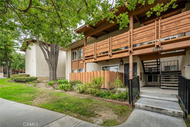 3721 Country Club Dr Unit 18, Long Beach, CA 90807 - view of property featuring stairway