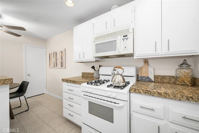3721 Country Club Dr Unit 18, Long Beach, CA 90807 - kitchen with white appliances, a ceiling fan, white cabinetry, dark countertops, and light tile patterned flooring