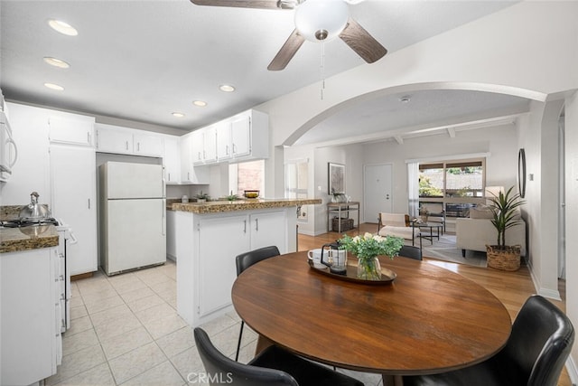 3721 Country Club Dr Unit 18, Long Beach, CA 90807 - dining space featuring arched walkways, a ceiling fan, recessed lighting, and light tile patterned flooring