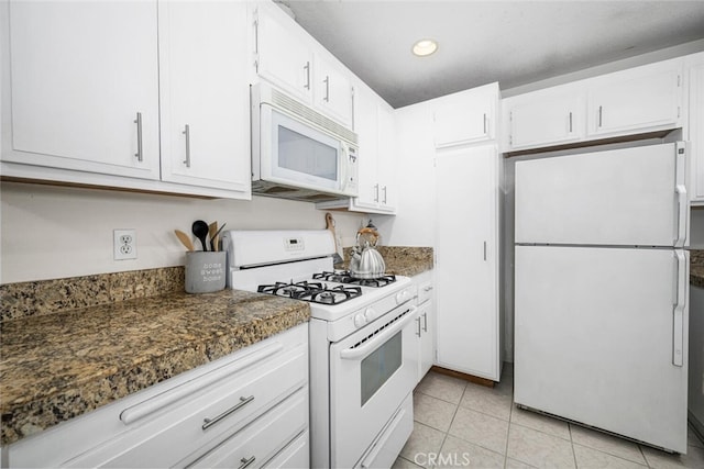 3721 Country Club Dr Unit 18, Long Beach, CA 90807 - kitchen featuring white appliances, light tile patterned floors, white cabinetry, recessed lighting, and dark countertops