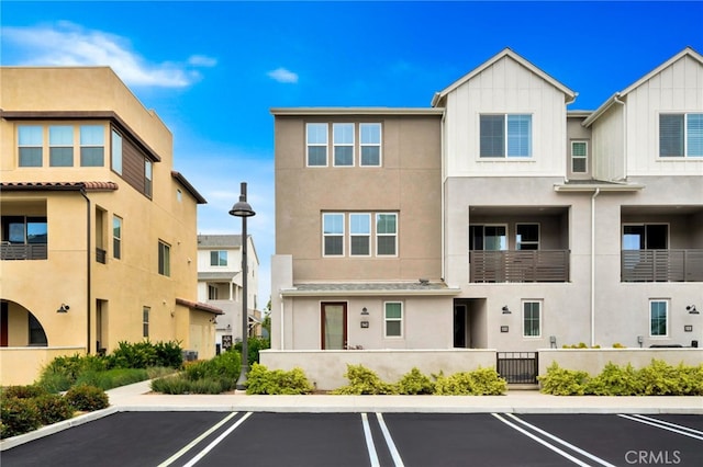 142 Juniper Dr, Rancho Mission Viejo, CA 92694 - view of property featuring uncovered parking