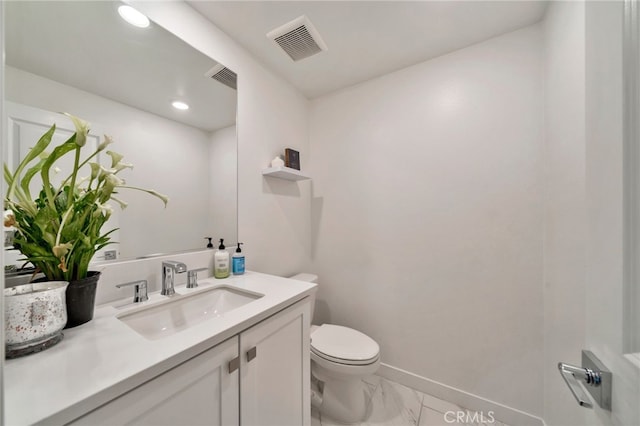 142 Juniper Dr, Rancho Mission Viejo, CA 92694 - bathroom with toilet, vanity, marble finish flooring, baseboards, and recessed lighting