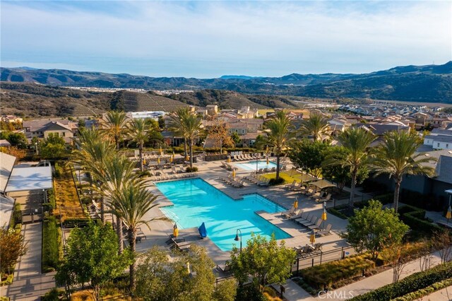142 Juniper Dr, Rancho Mission Viejo, CA 92694 - community pool with a mountain view, a patio, and a residential view