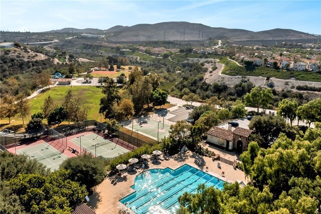 142 Juniper Dr, Rancho Mission Viejo, CA 92694 - aerial view of a mountain backdrop and a pool area