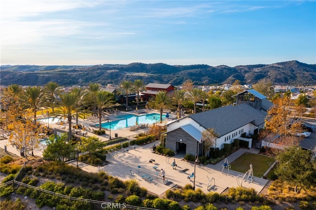 142 Juniper Dr, Rancho Mission Viejo, CA 92694 - drone / aerial view of a pool and a mountainous background