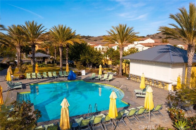 142 Juniper Dr, Rancho Mission Viejo, CA 92694 - community pool with a gazebo and a patio area