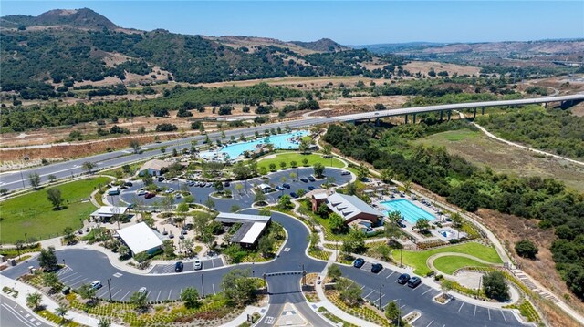 142 Juniper Dr, Rancho Mission Viejo, CA 92694 - drone / aerial view of a mountain backdrop and a pool