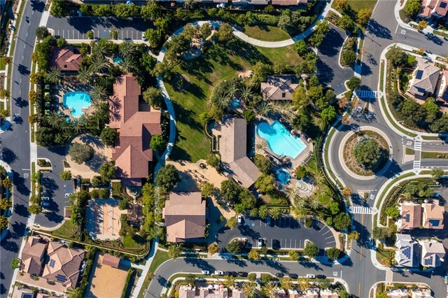 142 Juniper Dr, Rancho Mission Viejo, CA 92694 - aerial overview of property's location with a pool area and nearby suburban area