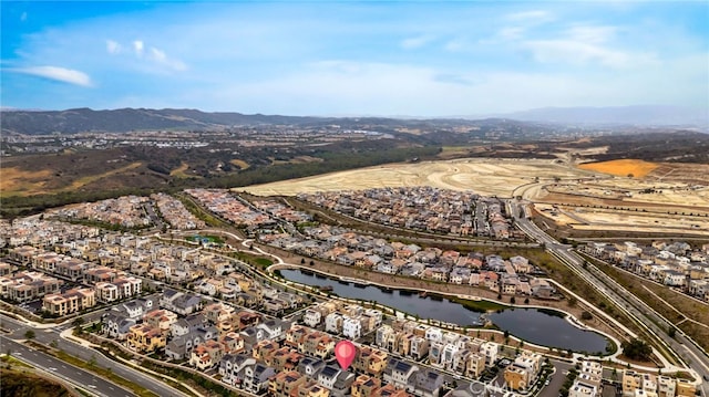 142 Juniper Dr, Rancho Mission Viejo, CA 92694 - aerial view of property's location with nearby suburban area and a water and mountain view