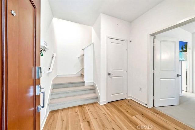 142 Juniper Dr, Rancho Mission Viejo, CA 92694 - stairway featuring wood finished floors and baseboards