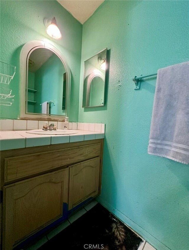 3748 W 118th St, Hawthorne, CA 90250 - bathroom with vanity and tile patterned flooring