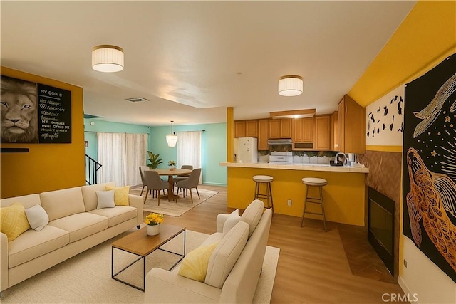 3748 W 118th St, Hawthorne, CA 90250 - living room featuring light wood-type flooring