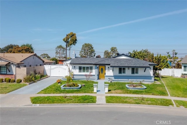 5911 Jones Ave, Westminster, CA 92683 - bungalow-style house with a gate, concrete driveway, and stucco siding