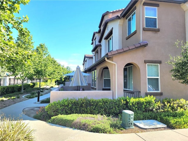 40955 Belleray Ave, Murrieta, CA 92562 - view of property exterior with stucco siding and a tiled roof