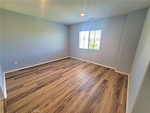 40955 Belleray Ave, Murrieta, CA 92562 - unfurnished room with dark wood-style floors and baseboards