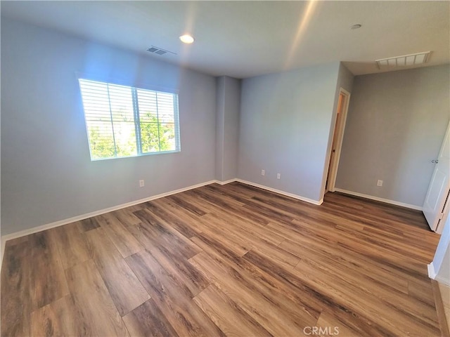40955 Belleray Ave, Murrieta, CA 92562 - empty room featuring baseboards and wood finished floors