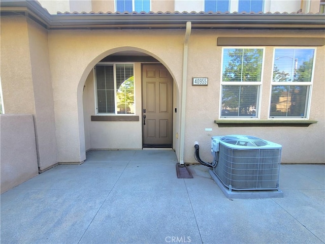 40955 Belleray Ave, Murrieta, CA 92562 - property entrance featuring central air condition unit and stucco siding