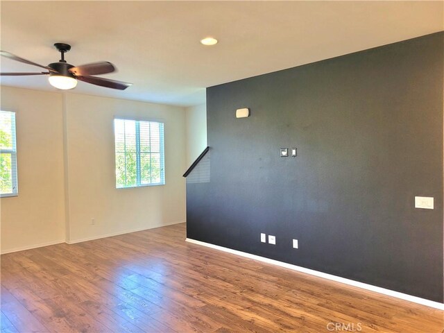 40955 Belleray Ave, Murrieta, CA 92562 - spare room featuring hardwood / wood-style floors, ceiling fan, baseboards, and recessed lighting