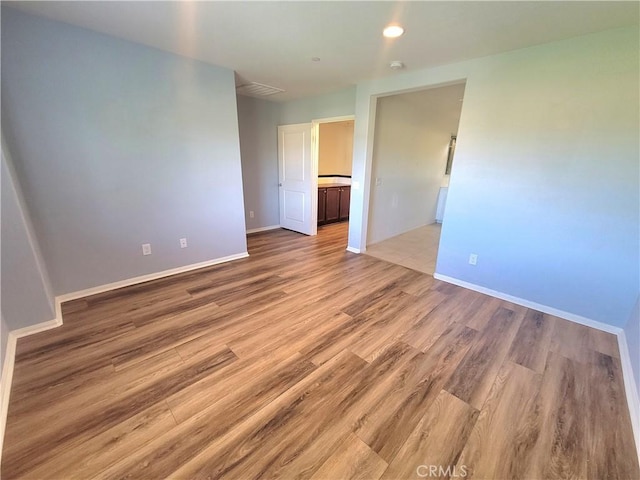 40955 Belleray Ave, Murrieta, CA 92562 - unfurnished room featuring light wood-type flooring, baseboards, and recessed lighting