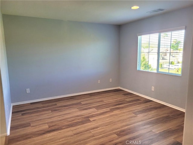 40955 Belleray Ave, Murrieta, CA 92562 - spare room with wood finished floors, baseboards, and recessed lighting
