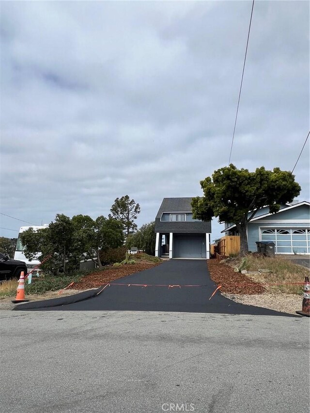 1311 15th St, Los Osos, CA 93402 - view of front of property with driveway and a garage