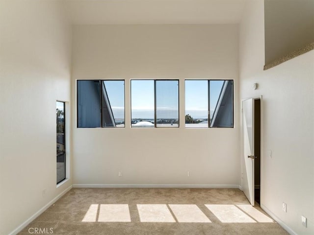 1311 15th St, Los Osos, CA 93402 - spare room featuring light carpet and baseboards