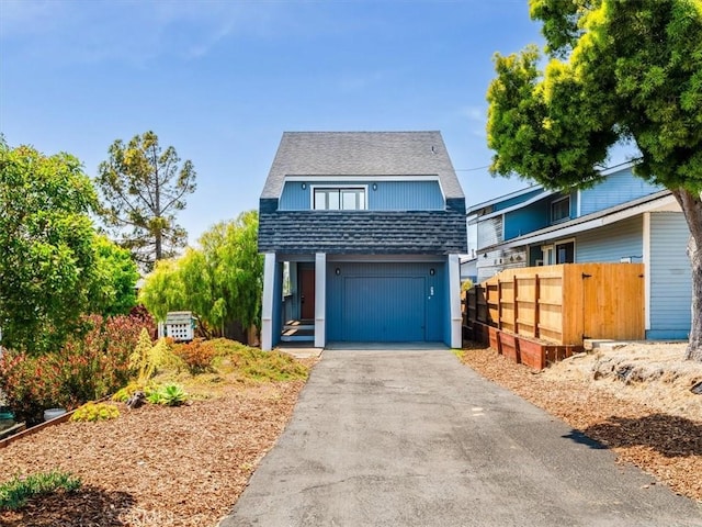1311 15th St, Los Osos, CA 93402 - view of front of house with driveway, roof with shingles, and a garage